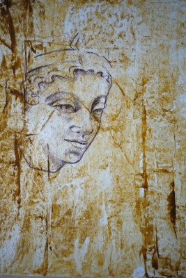 Gemälde in Mischtechnik  in goldenen und gelben Strukturen mit buddhistischem Kopf